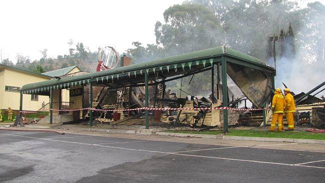 The smouldering ruin of the Buchan Caves Hotel after it was destroyed by fire in April last year.