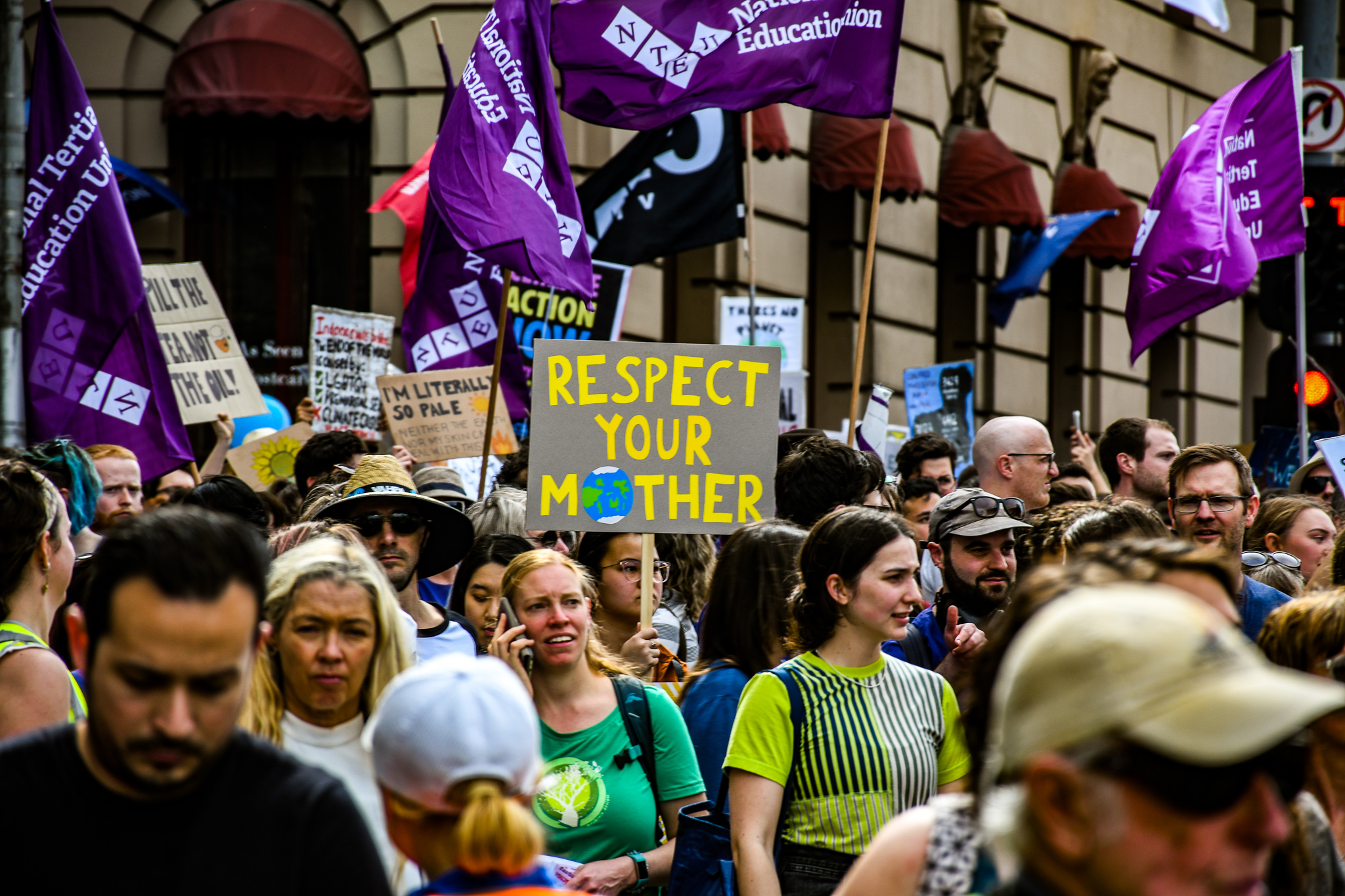 Marchers highlight the heavy toll of the climate crisis on women and girls