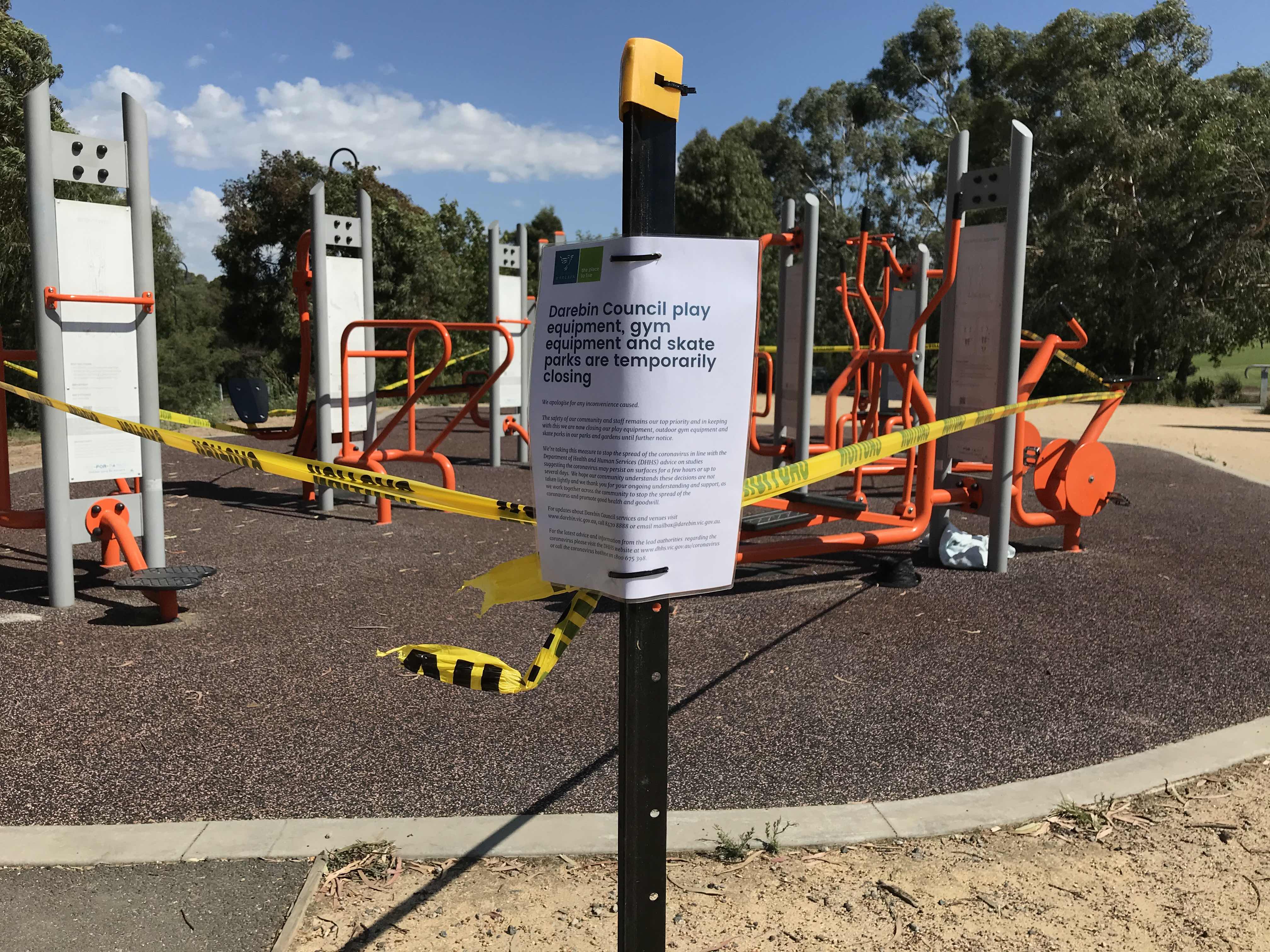 A sign at All Nations Park: &ldquo;Darebin Council play equiment, gym equipment and skate parks are temporarily closing. We apologise for any convenience caused.&rdquo;