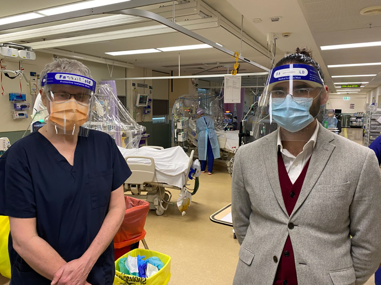 Dr Monty (pictured right) with Dr Craig French, director of the ICU at Western Health, where the hoods are being used in a clinical trial. Photo: supplied.