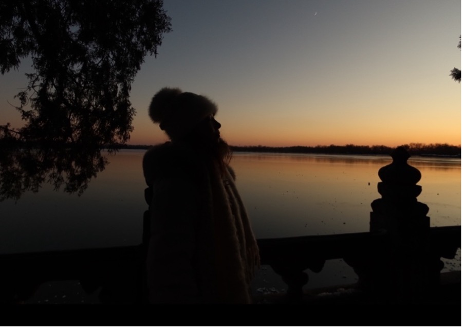 Yu Lee watches the sun set. Photo by Yu Lee.