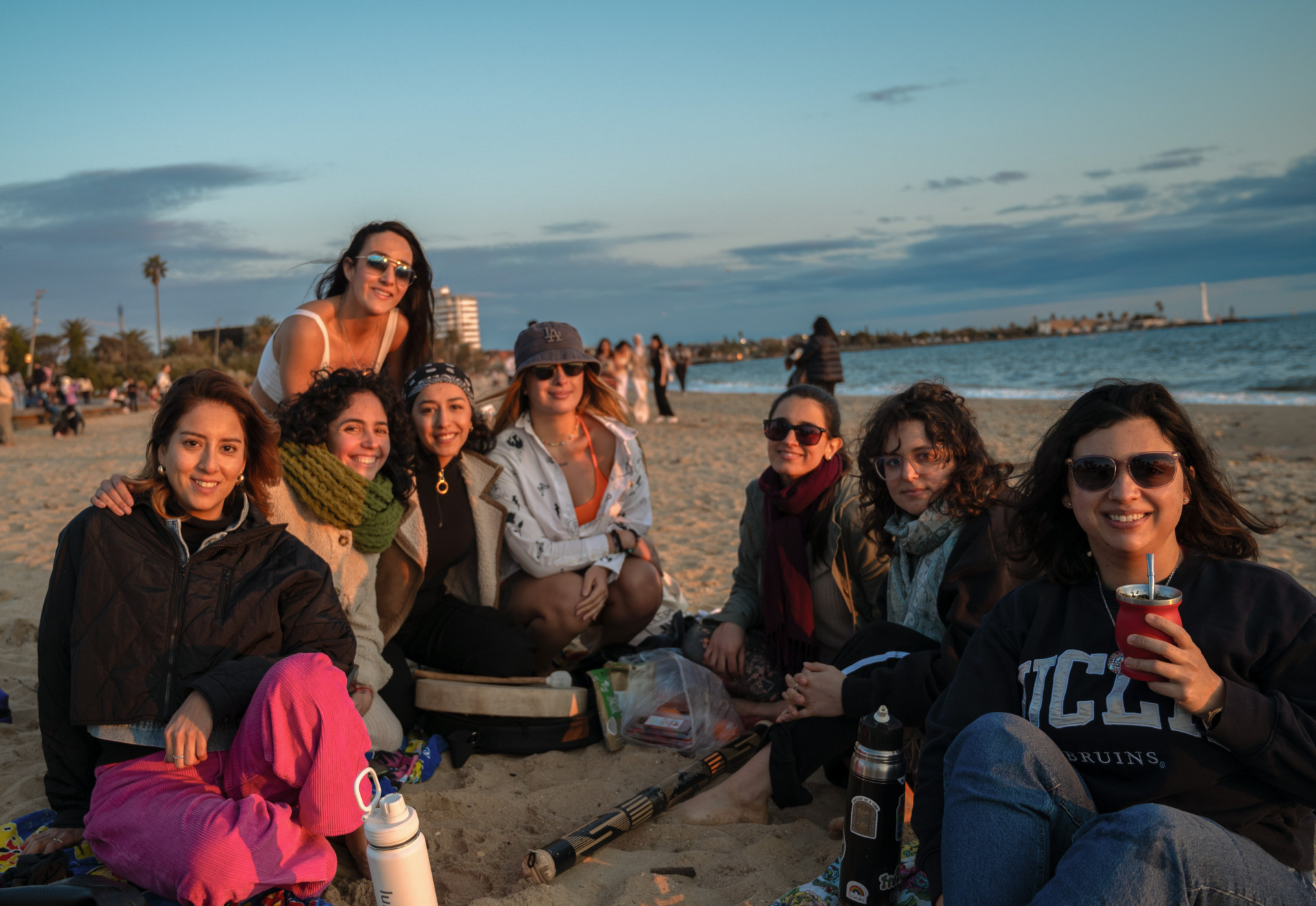 A group photo of Latin American Women&rsquo;s Circle members on St Kilda beach. As long as the weather is good, the group&rsquo;s organiser, Carolina Romero (second from the left) gets members together on the beach every Sunday afternoon.