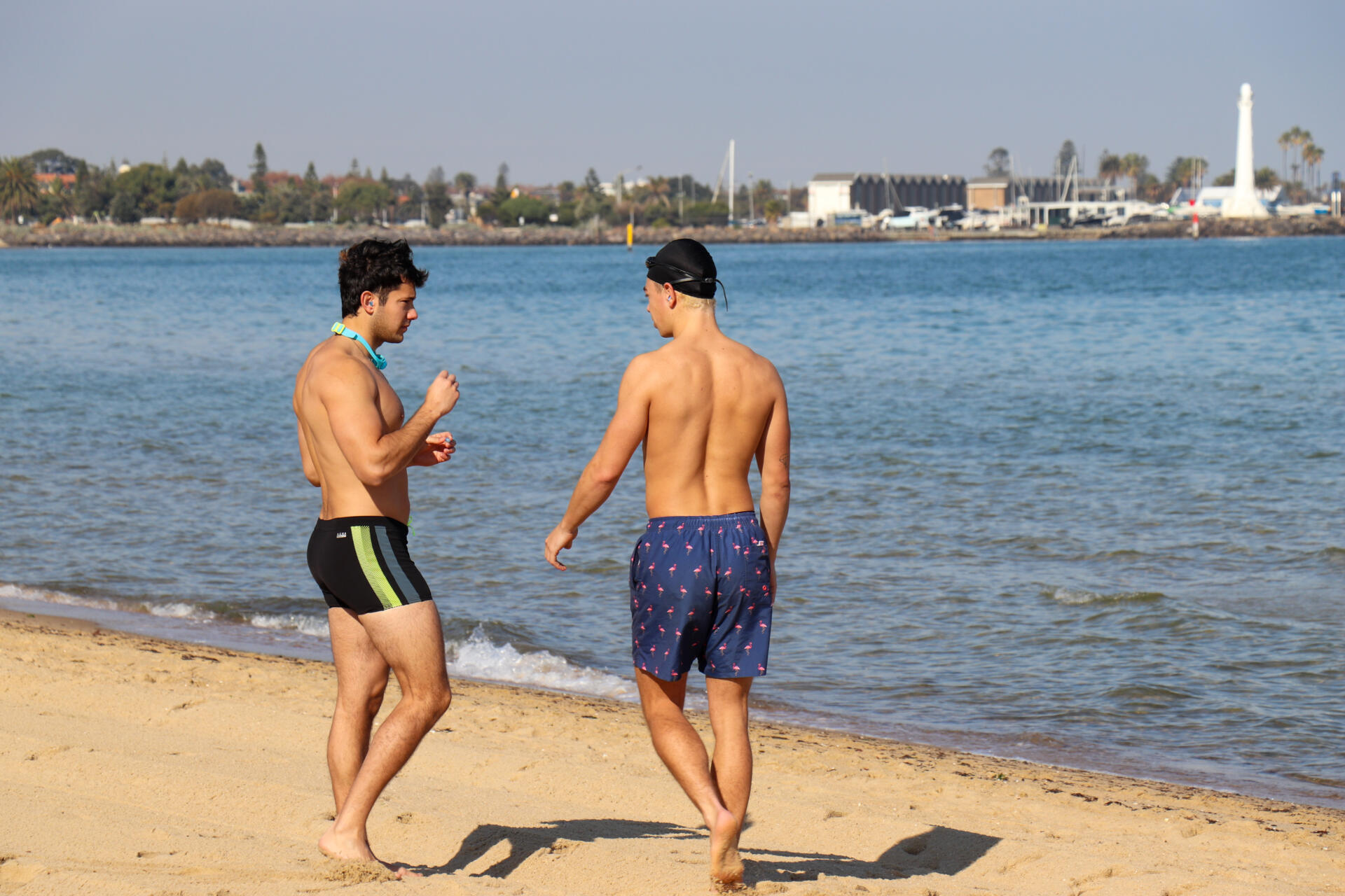 Two men prepare to brave the cold winter waters of St Kilda Beach, oblivious to any water quality issues.