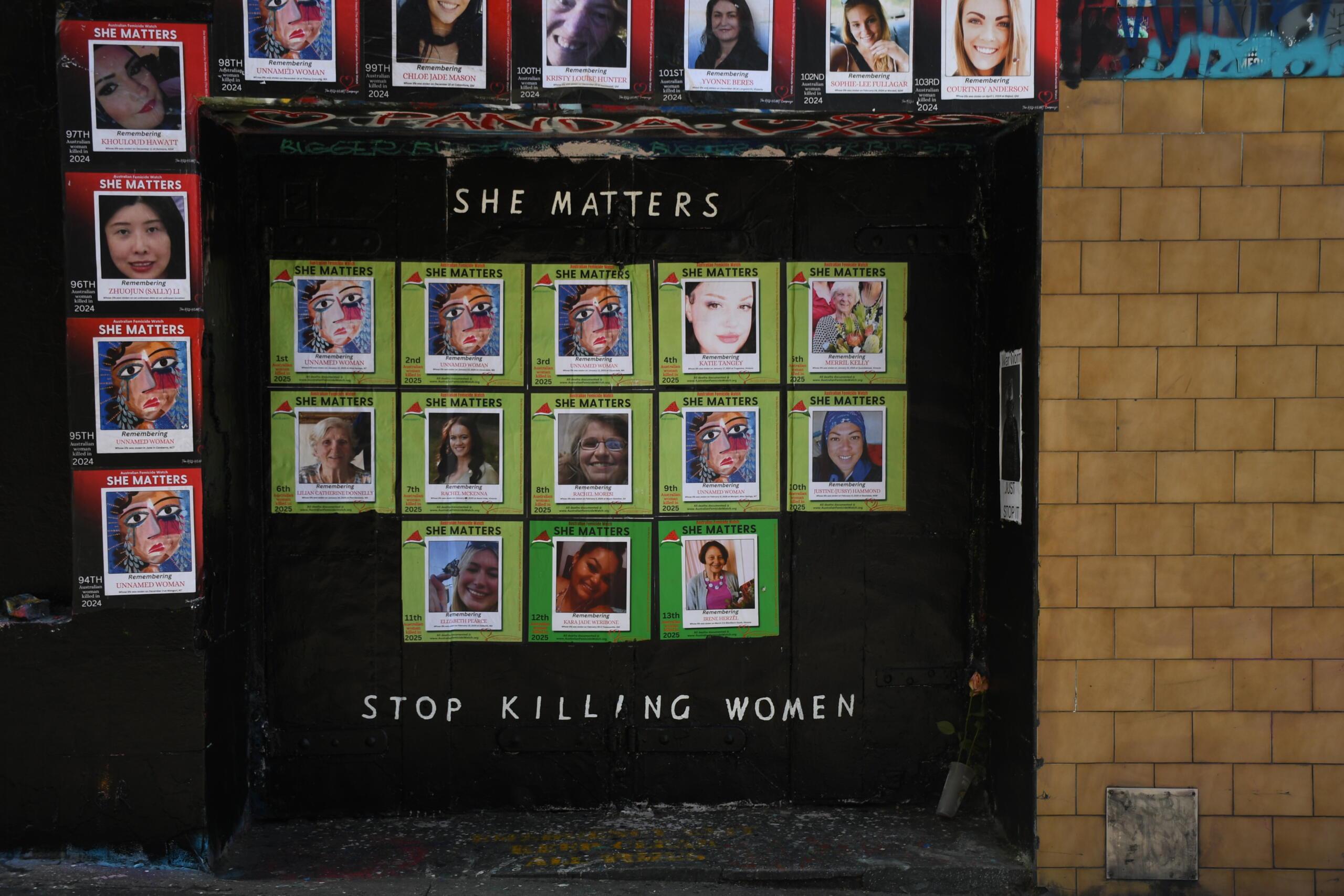 The mural with its plea and demand to stop the epidemic of violence against women. Photo: Ashleigh Wyss