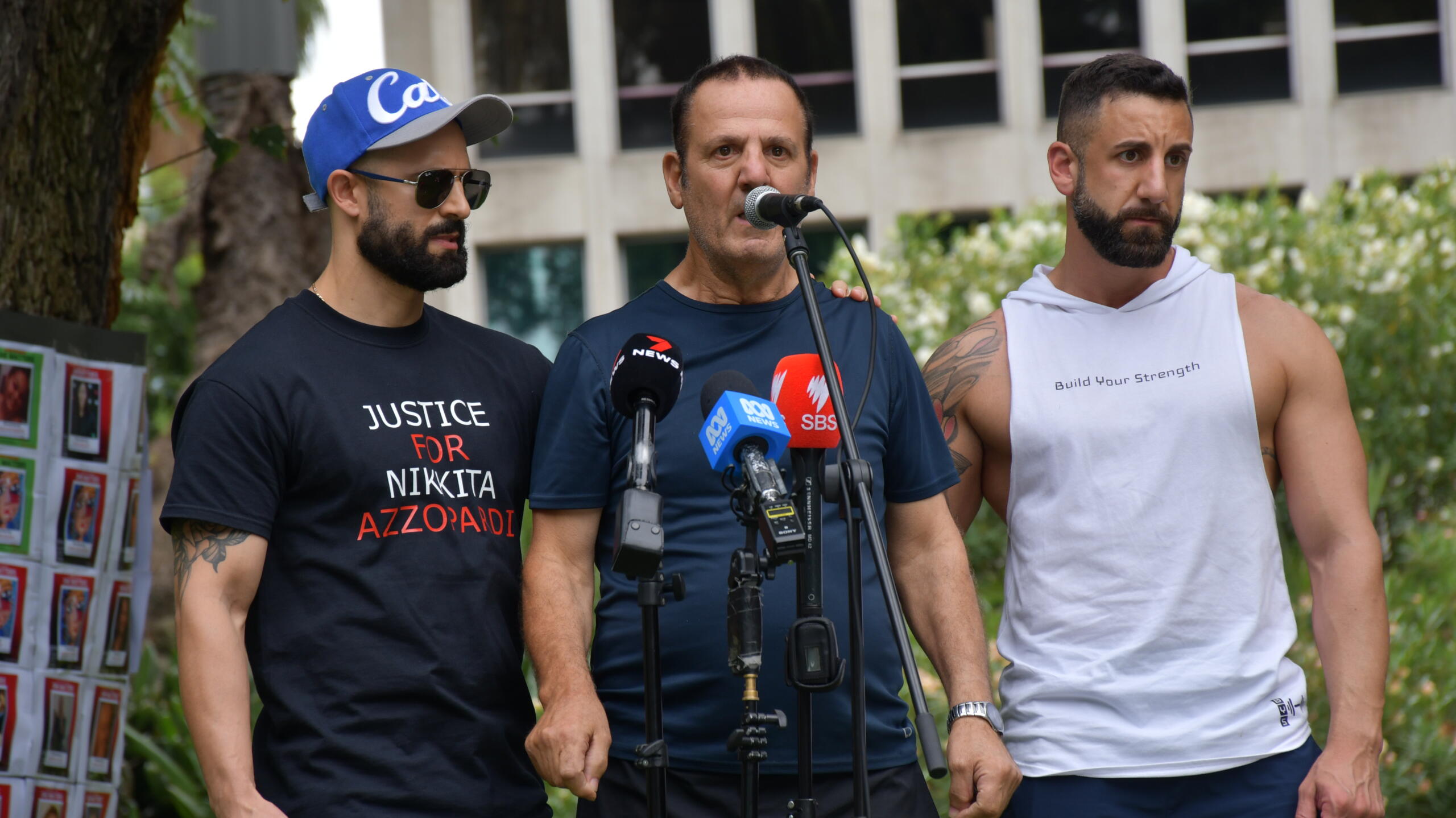 Nikita&rsquo;s father Edward (centre), and brothers Shaun (left), and Darren (right) Azzopardi at the She Matters rally in March. Photo: Ashleigh Wyss