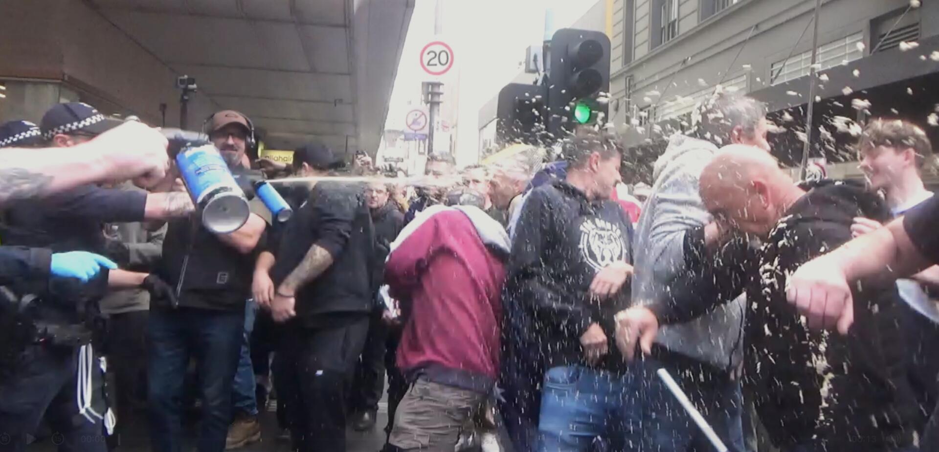 Police deploy OC spray against March for Australia protesters. Photo by Alexandra Nevill.