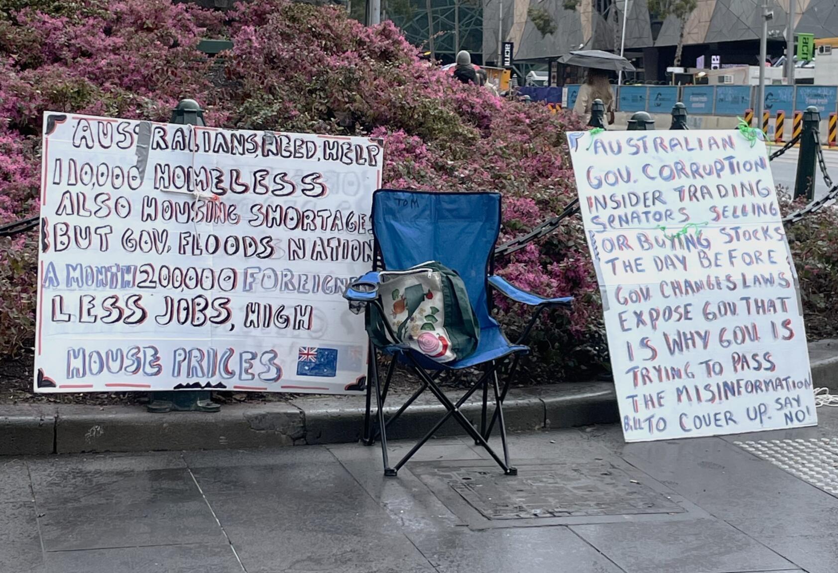 Placards from protesters at the March for Australia rally. Photo by Alexandra Nevill.