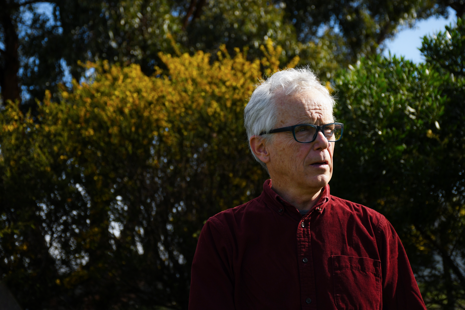Alan Pentland traded Melbourne stages for French Island bushland, becoming the steward of 75 acres of revegetation. He has planted thousands of trees to create a wildlife corridor and pens a community newsletter, Off the Grid. Photo by Ashleigh Wyss.