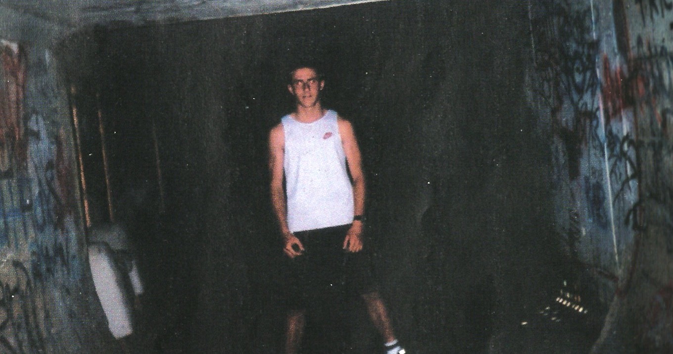 Brian McHugh at the edge of a drain, 1999. Photo: Michael Douglas.