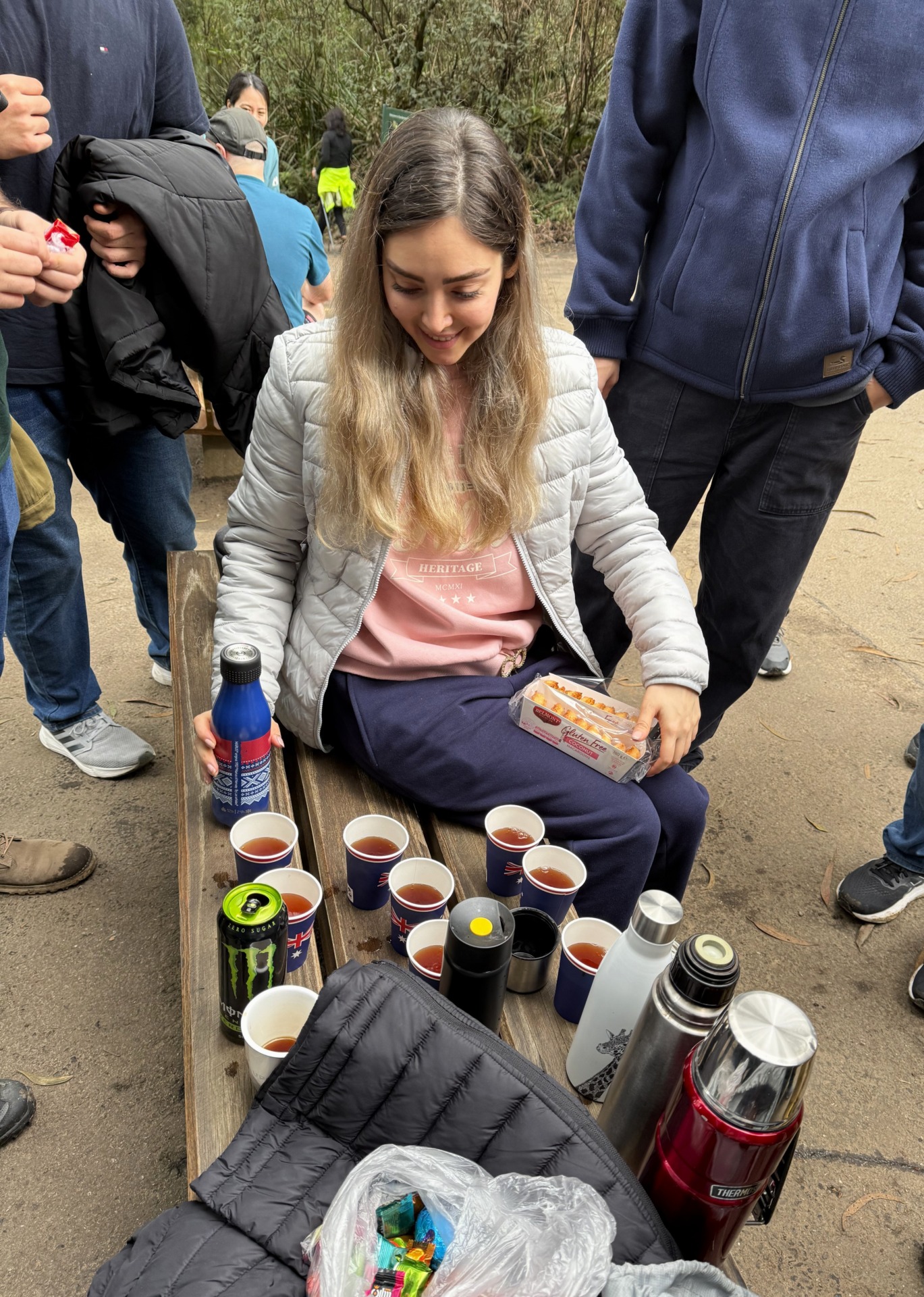 Iranian Society members sharing tea and cookies at a hiking event. Photo: Joyce Le.